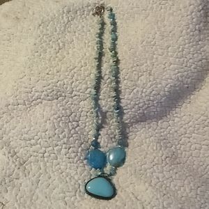 Hand crafted turquoise beaded necklace.